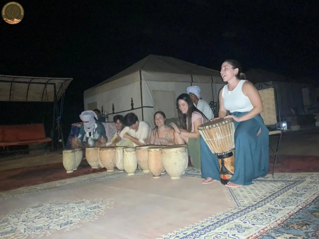 Tour From Marrakech To Merzouga - Merzouga desert playing music in Morocco
