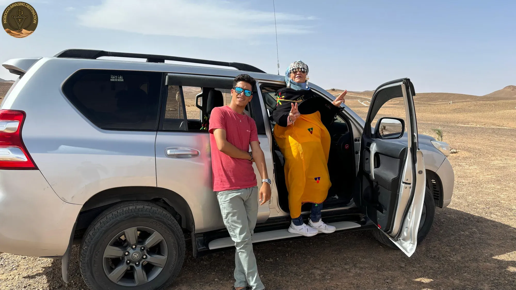 Travellers in layered desert clothing in Morocco