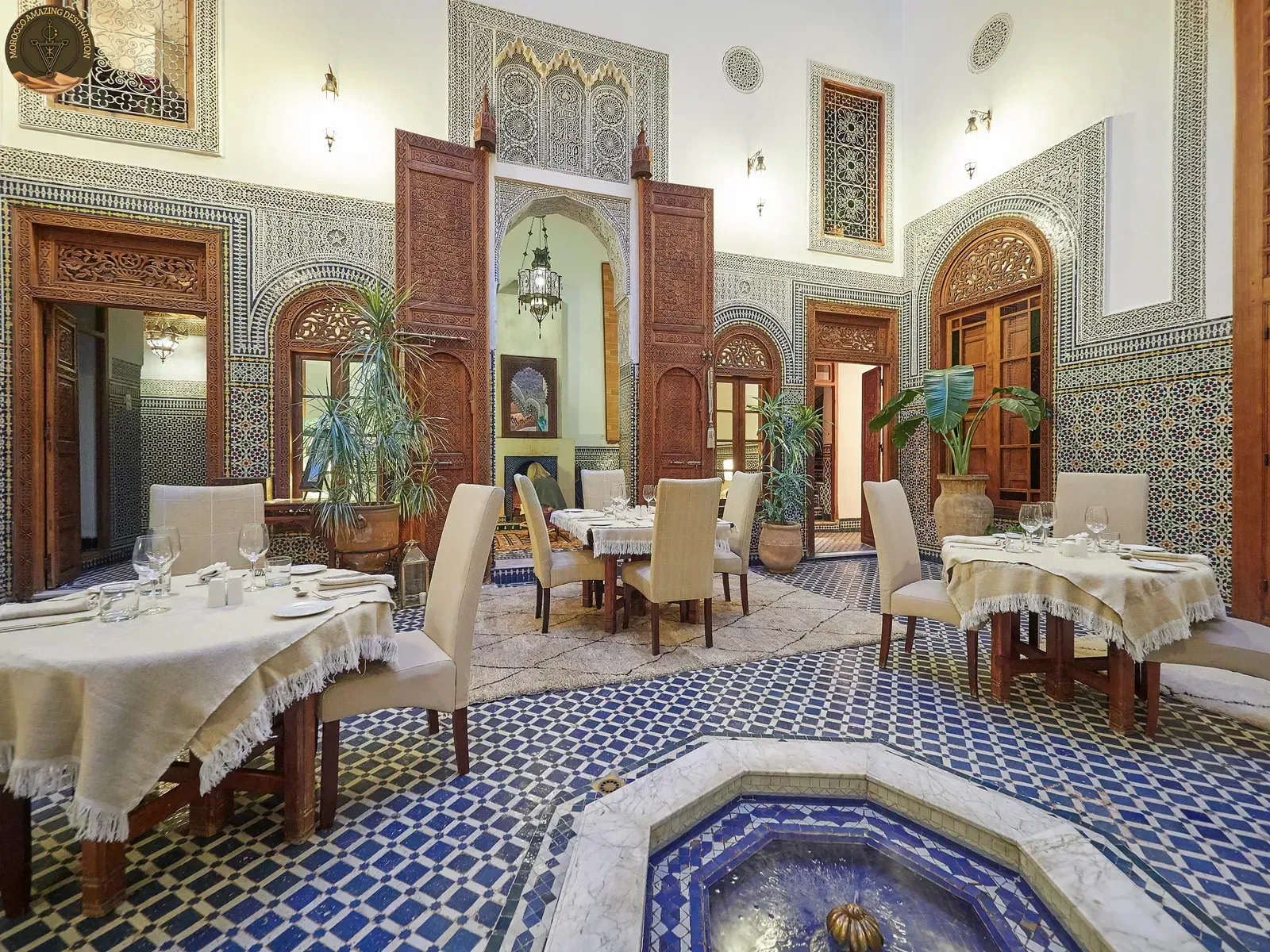 Traditional Moroccan restaurant with lanterns and carved wood